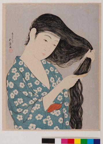 髪梳ける女